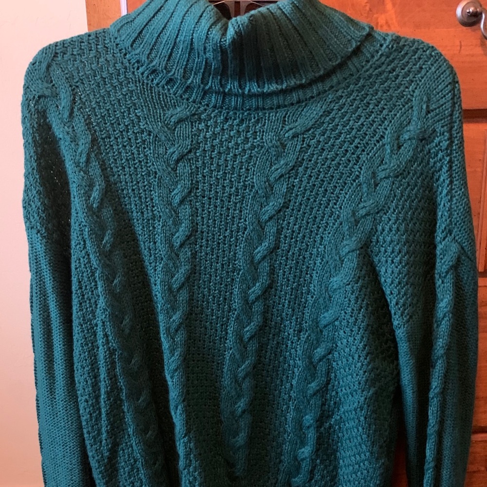 green turtleneck sweater